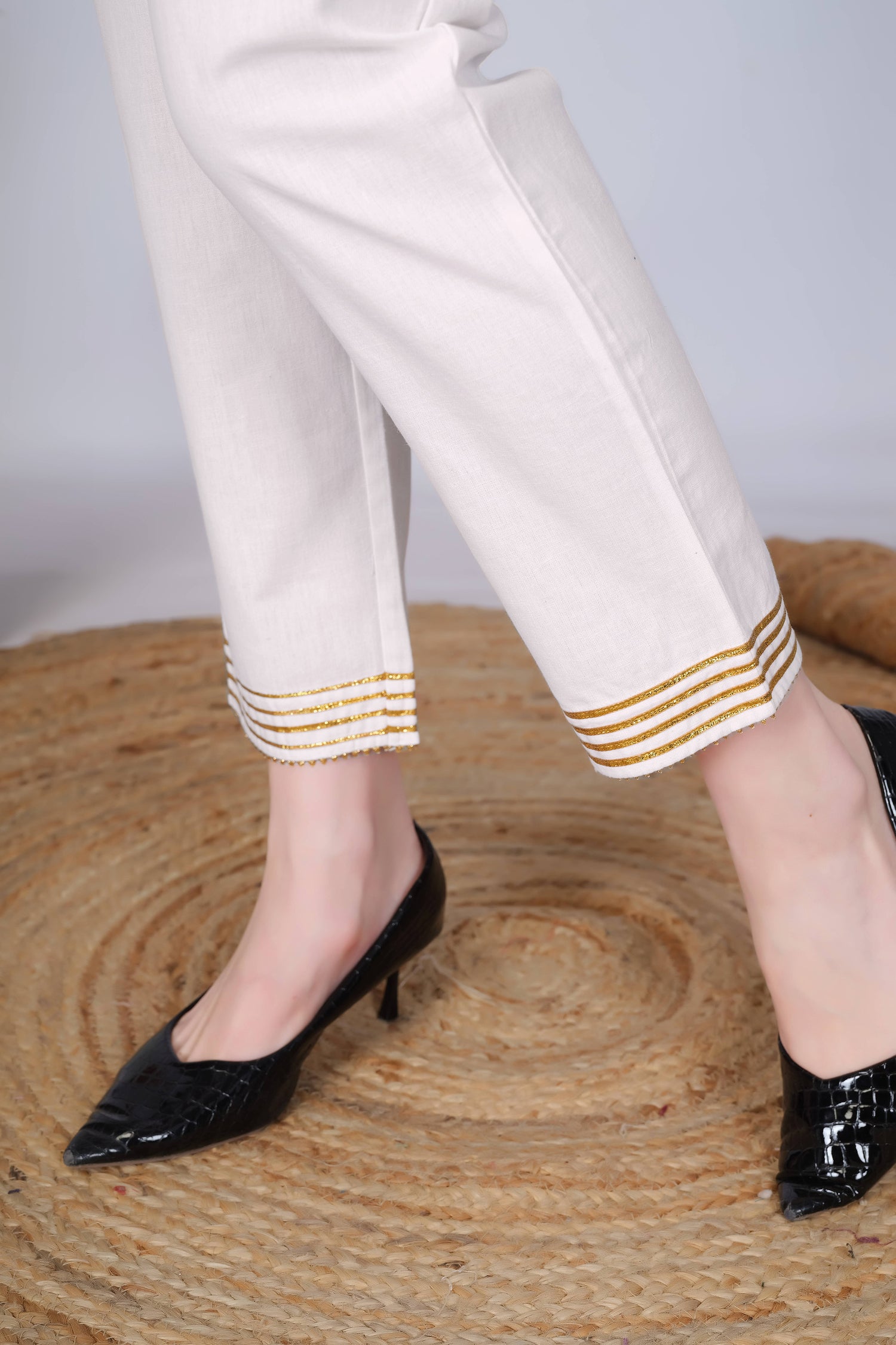 Off White Slim Fit Cotton Pants With Gold Lace Hem