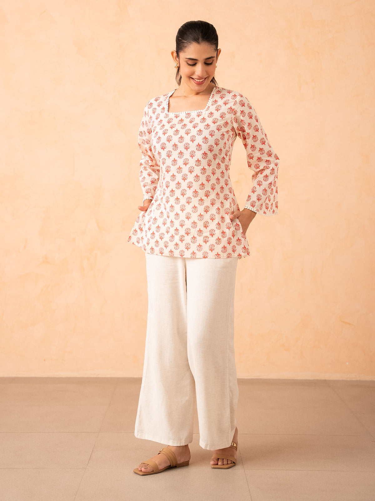 Ivory & Pink Floral motif Print Top with Bell Sleeves and Corset Back