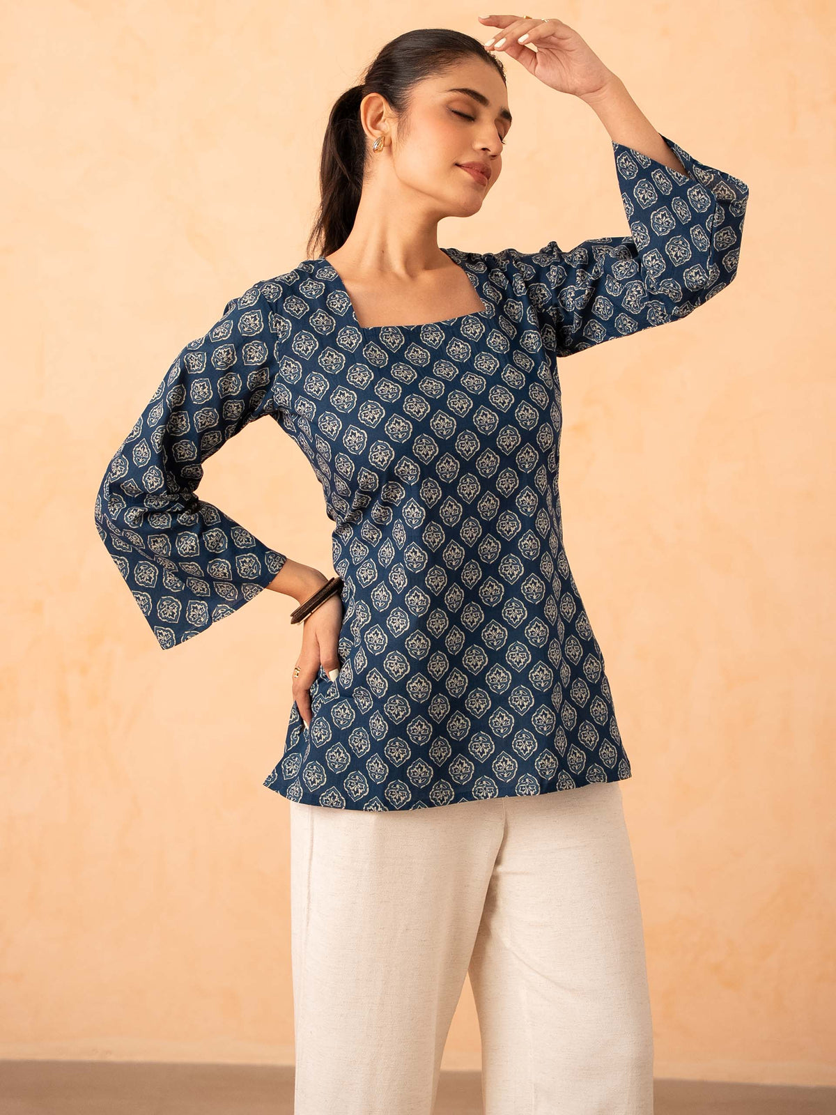 Navy Blue Printed Top with Bell Sleeves and Corset Back